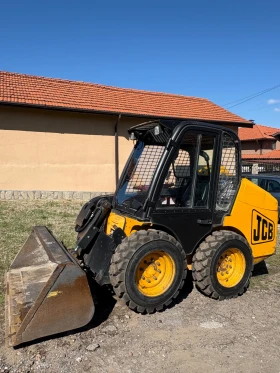 Мини челни товарачи JCB Robot с кабина, снимка 1