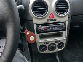 Opel Corsa 1.3 д  екофлекс 75 кс., снимка 11