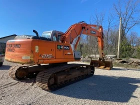 Багер New Holland E215B, снимка 3