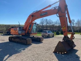 Багер New Holland E215B, снимка 4