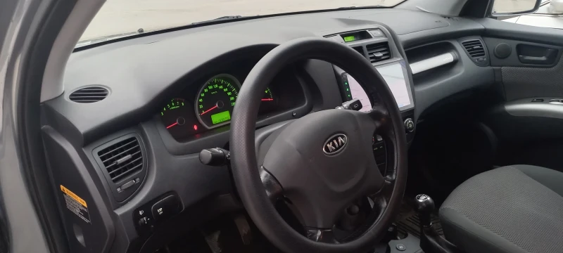 Kia Sportage Газ бензин климатроник, снимка 10 - Автомобили и джипове - 53487421