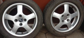 Гуми с джанти Bridgestone 205/55R16, снимка 8 - Гуми и джанти - 52670667