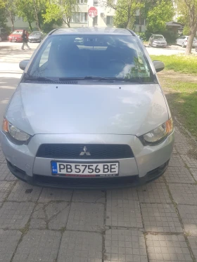 ������ Mitsubishi Colt