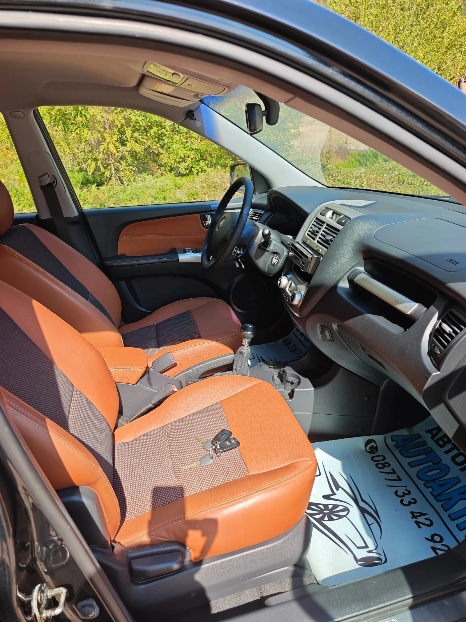 Kia Sportage 2.0CRDI УНИКАТ, снимка 2 - Автомобили и джипове - 56191321