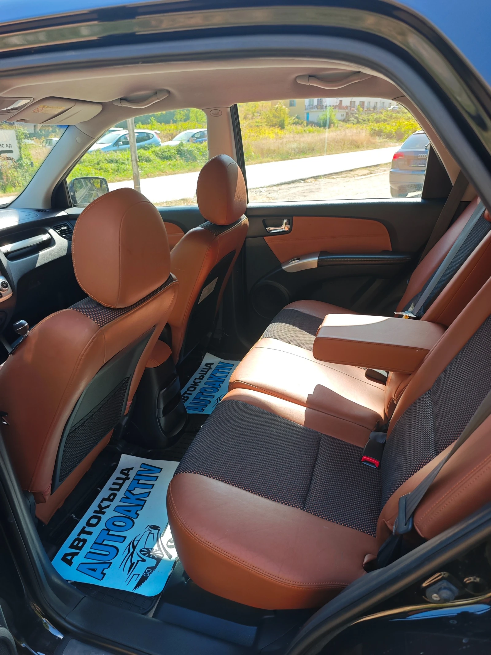 Kia Sportage 2.0CRDI УНИКАТ, снимка 9 - Автомобили и джипове - 56191321
