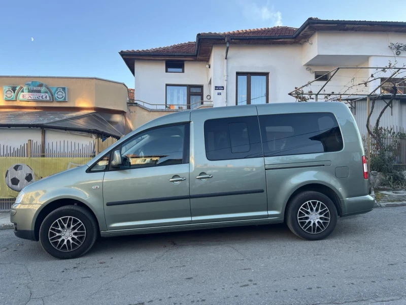 VW Caddy 1.6 бензин/газ 7 места maxi, снимка 11 - Автомобили и джипове - 47905456