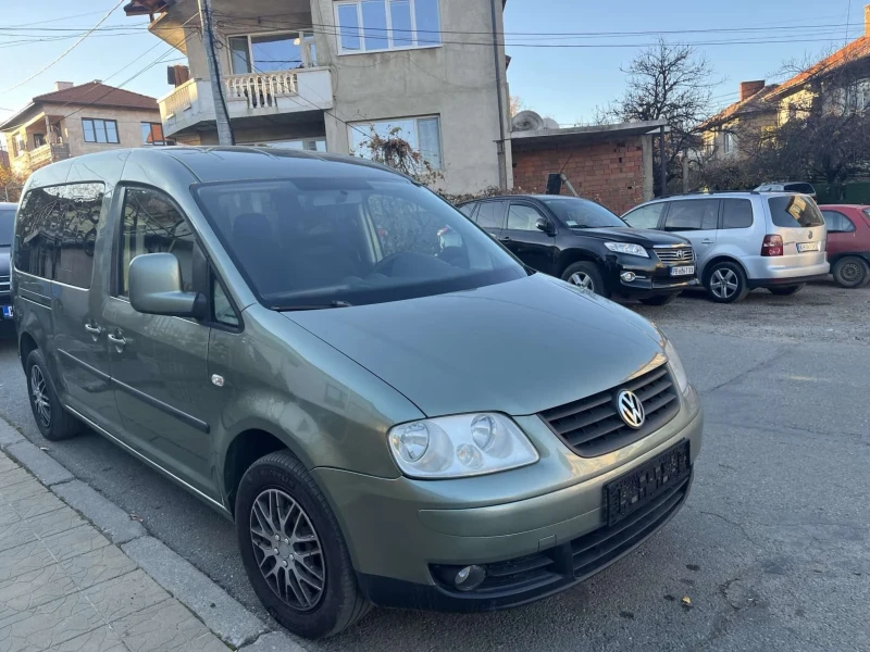 VW Caddy 1.6 бензин/газ 7 места maxi, снимка 15 - Автомобили и джипове - 47905456