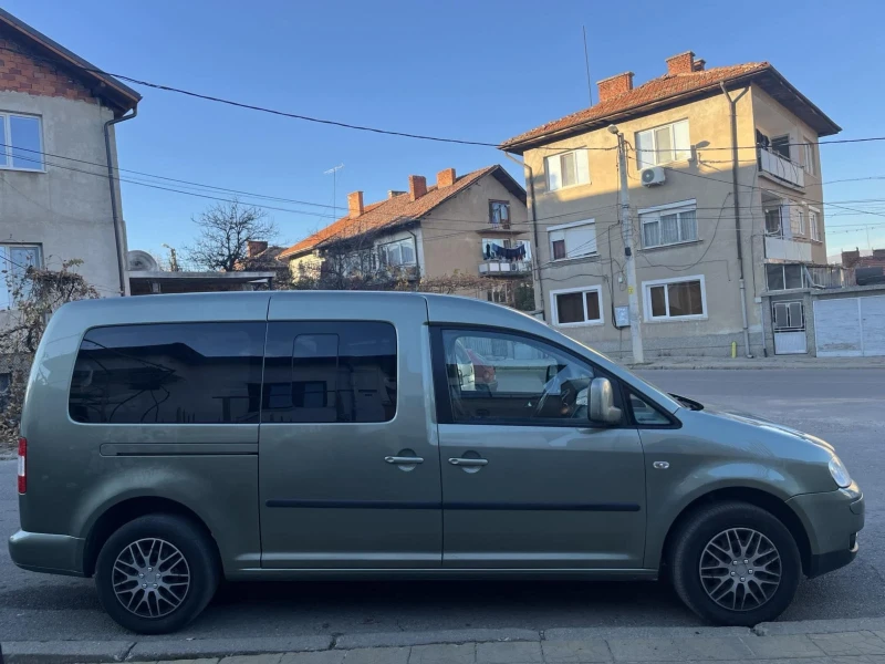 VW Caddy 1.6 бензин/газ 7 места maxi, снимка 16 - Автомобили и джипове - 47905456