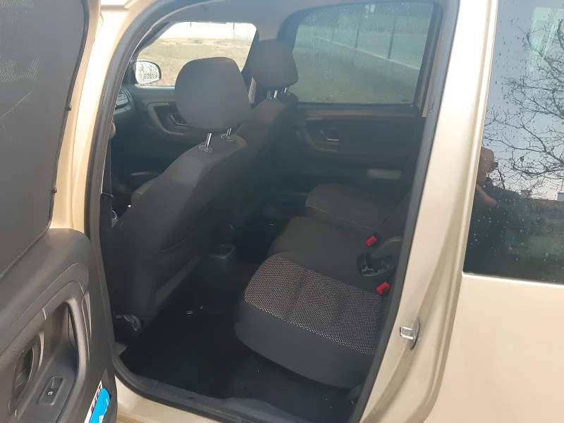 Skoda Roomster 1.6 TDI 90 K.C. SCOUT, снимка 10 - Автомобили и джипове - 52281039