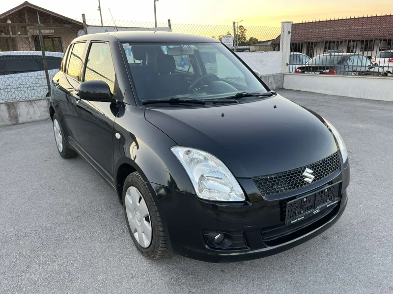 Suzuki Swift 1.3I 90кс 4Х4 EURO 4 KЛИМАТИК , снимка 3 - Автомобили и джипове - 51319621