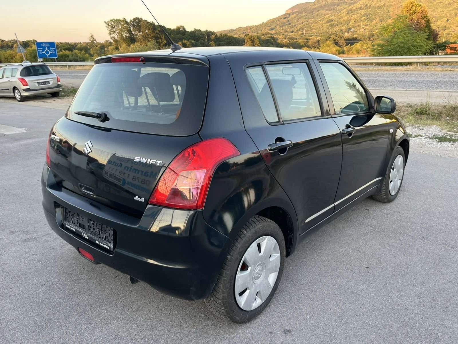 Suzuki Swift 1.3I 90кс 4Х4 EURO 4 KЛИМАТИК  - изображение 4