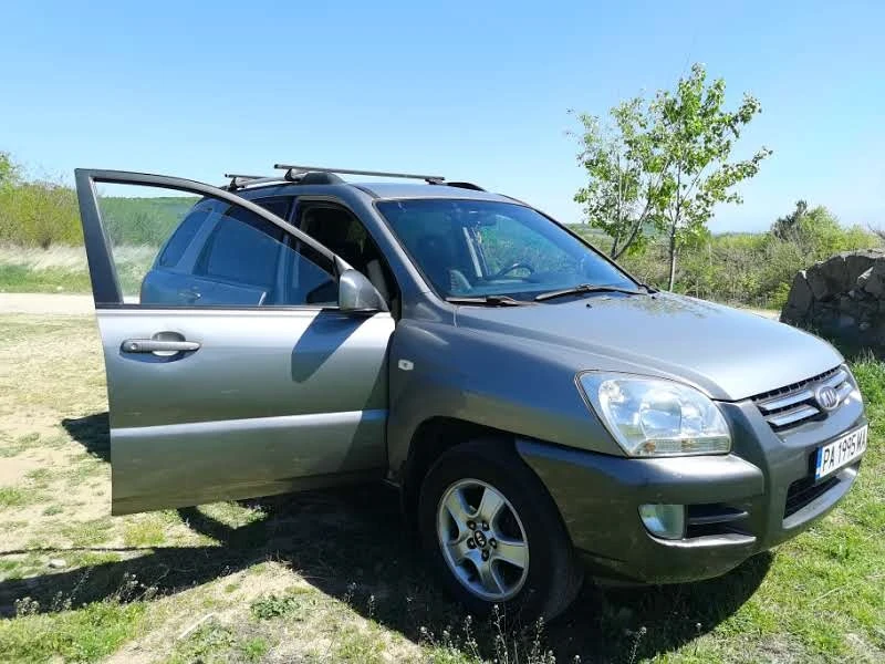 Kia Sportage, снимка 8 - Автомобили и джипове - 53840738