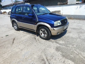     Suzuki Grand vitara  2.0  128