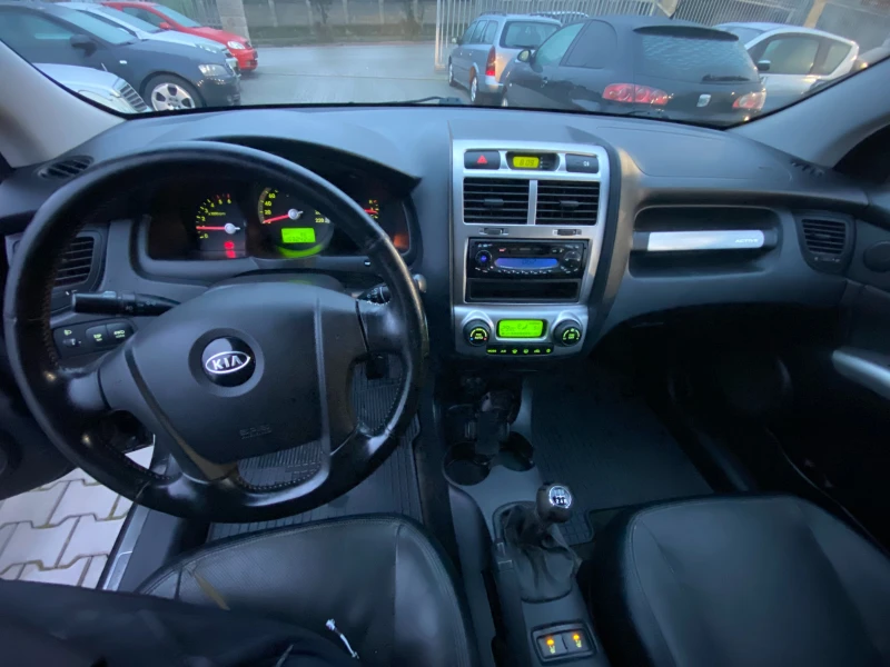 Kia Sportage 2.0crdi 113к.с, снимка 12 - Автомобили и джипове - 52885894