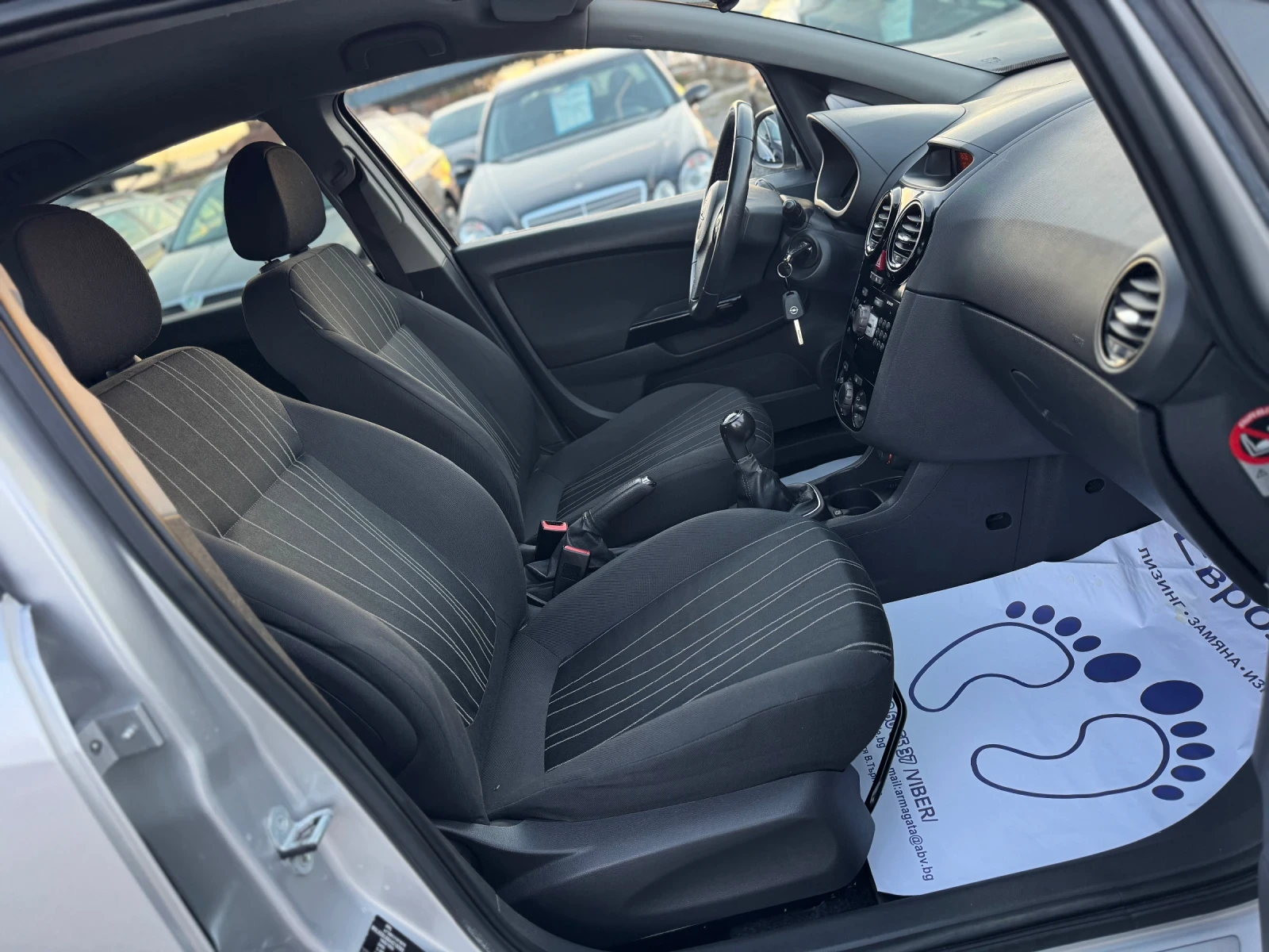Opel Corsa 1.2i 85 КЛИМАТИК | Mobile.bg — изображение 14