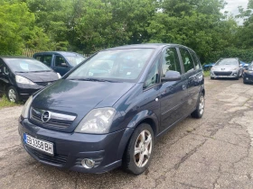 Opel Meriva 1.3CDTI Клима - 1400 € / 2738.16 лв. - 63389110 1