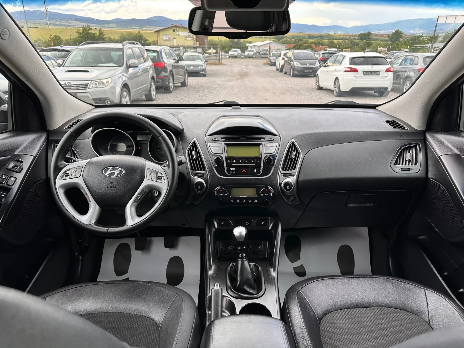 Hyundai IX35 1.6i-КСЕНОН-ЛЕД-КОЖА-ПОДГРЕВ-РЕАЛЕН ПРОБЕГ-ФУЛ-ТОП, снимка 14 - Автомобили и джипове - 54958561