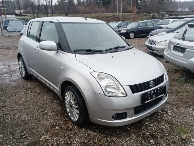 Suzuki Swift 1.3i ТОП СЪСТОЯНИЕ , снимка 1 - Автомобили и джипове - 39827028