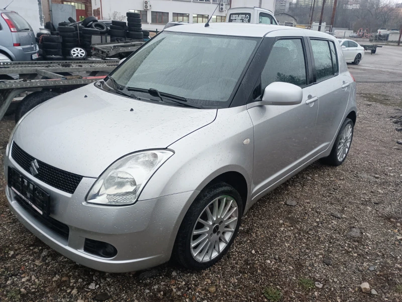 Suzuki Swift 1.3i ТОП СЪСТОЯНИЕ , снимка 2 - Автомобили и джипове - 39827028