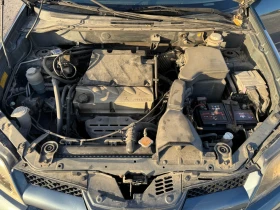 Mitsubishi Outlander 2.4 Бензин/Газ 4х4, снимка 11