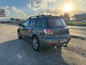 Mitsubishi Outlander 2.4 Бензин/Газ 4х4, снимка 2