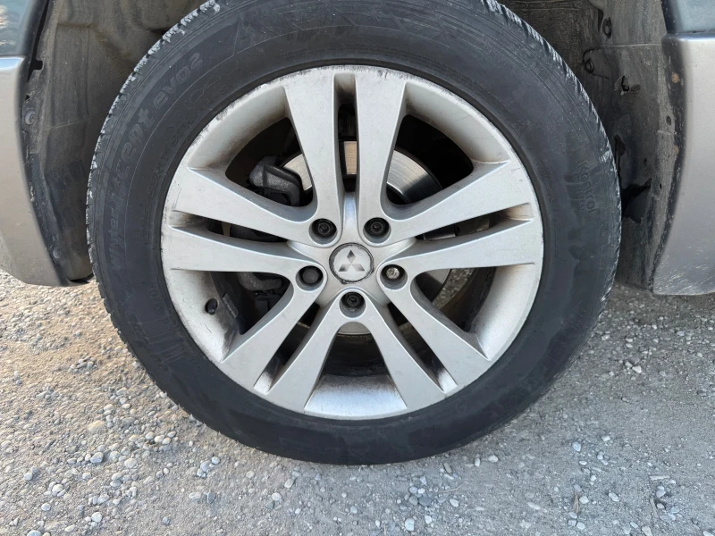 Mitsubishi Outlander 2.4 Бензин/Газ 4х4, снимка 12 - Автомобили и джипове - 52553030