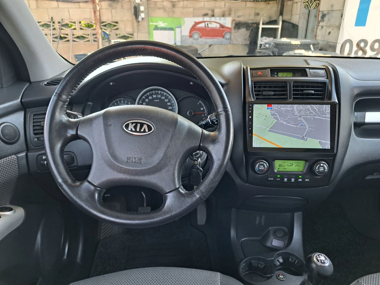 Kia Sportage 2.0 Газ Navi, снимка 15 - Автомобили и джипове - 55565159