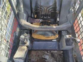 Мини челни товарачи Takeuchi TL130, снимка 7