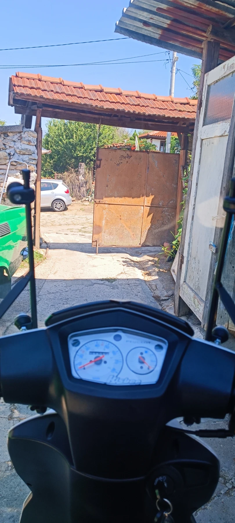 Peugeot Kissbee скутер