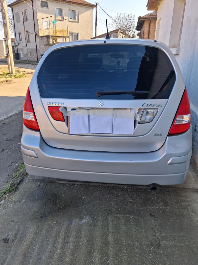 Suzuki Liana, снимка 3 - Автомобили и джипове - 52772580
