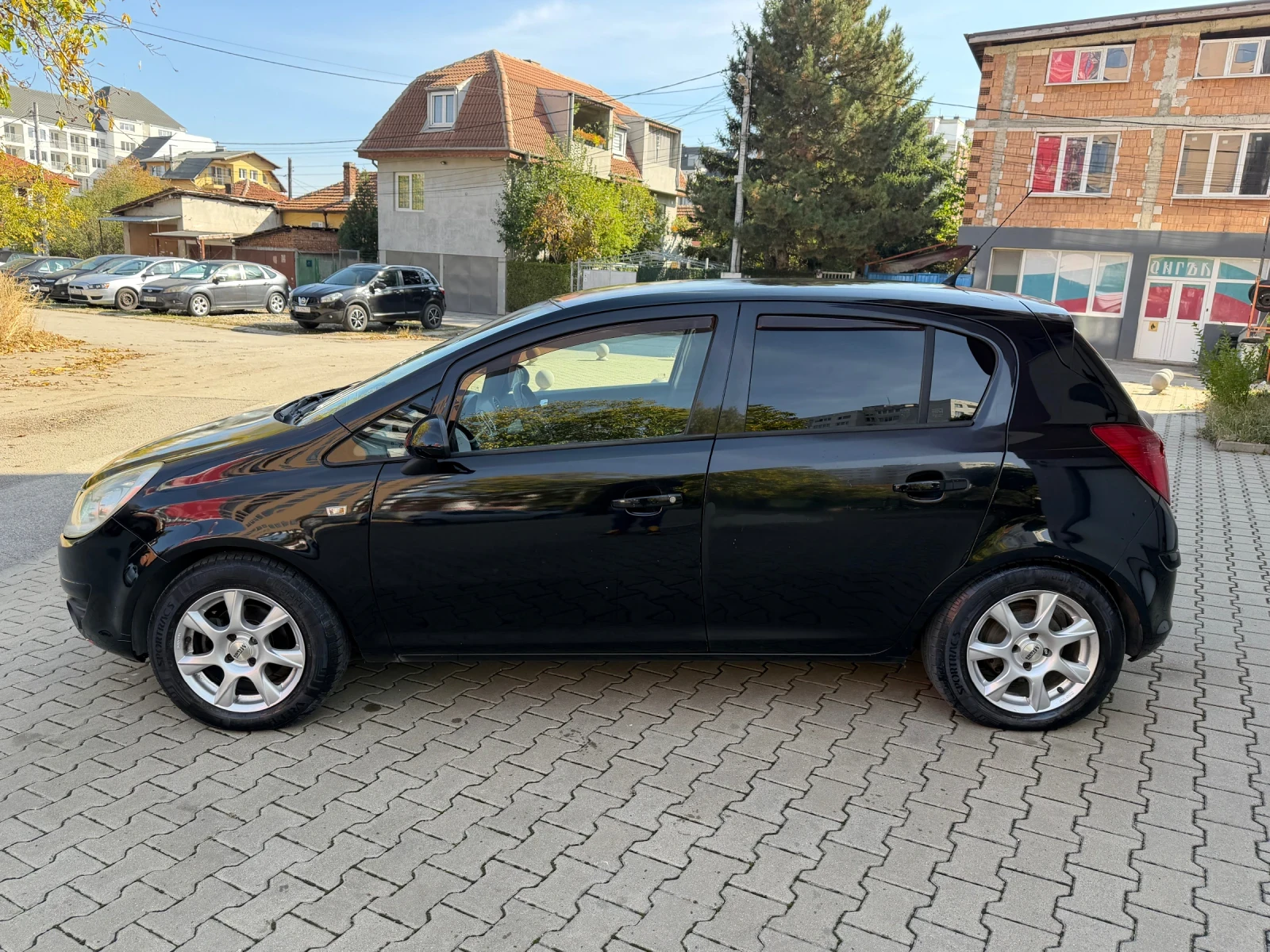Opel Corsa 1.4 Бензин-Газ!, снимка 7 - Автомобили и джипове - 56634443