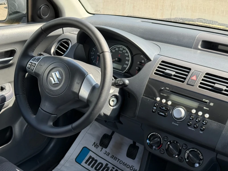 Suzuki Swift 1.3 Facelift , снимка 17 - Автомобили и джипове - 52316376