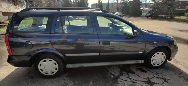 Opel Astra, снимка 12 - Автомобили и джипове - 53498338