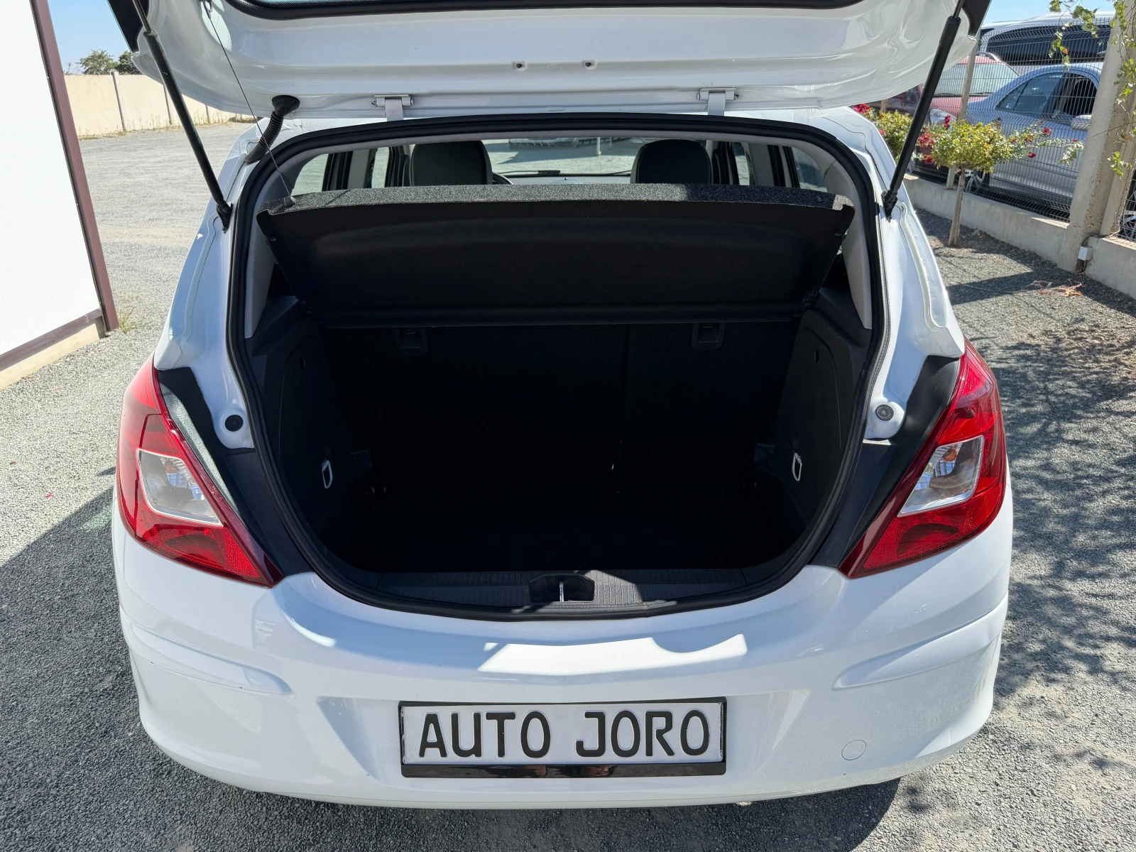 Opel Corsa 1.2i-Газов Инжекцион, снимка 13 - Автомобили и джипове - 56111434