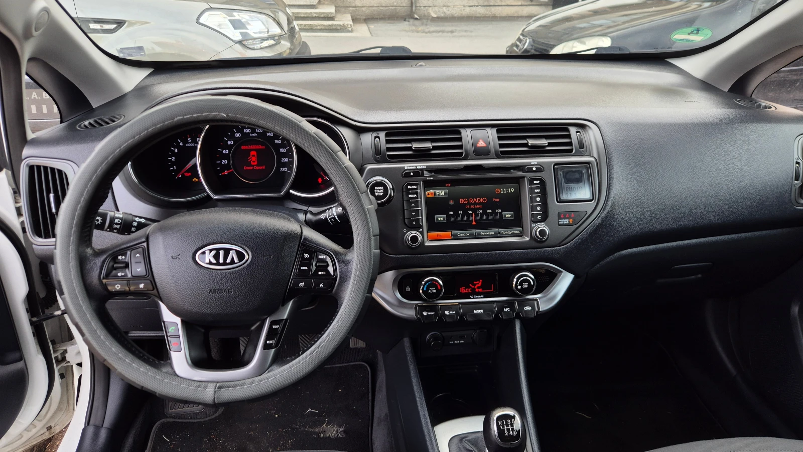 Kia Rio 1.1 CRDI 75hp Evro 5b Navi 6ck, снимка 13 - Автомобили и джипове - 56302369
