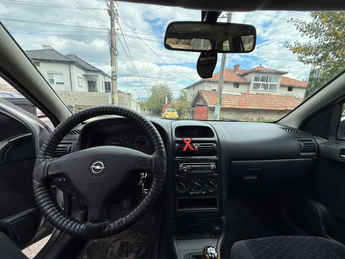 Opel Astra, снимка 16 - Автомобили и джипове - 56683381