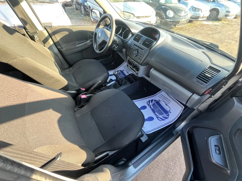 Subaru Justy 1.3 БЕНЗИН 4Х4, снимка 14 - Автомобили и джипове - 53086986