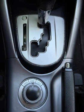 Mitsubishi Outlander 2.4 бензин/газ 4х4 7места BRC LPG автомат, снимка 12