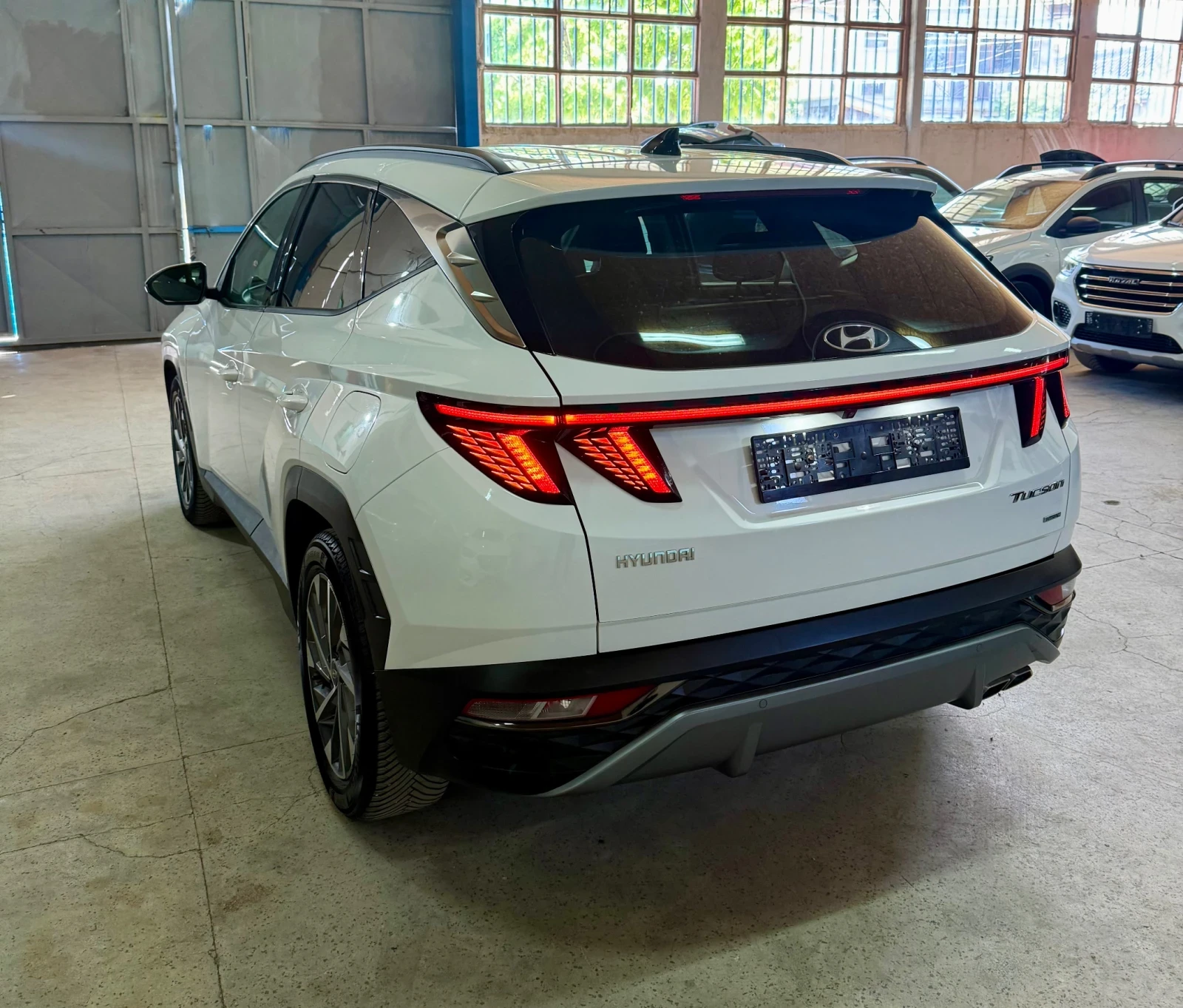 Hyundai Tucson 1.6 CRDi Mild-Hybrid 4x4   Автоматик   09.2021 г., снимка 7 - Автомобили и джипове - 55272311