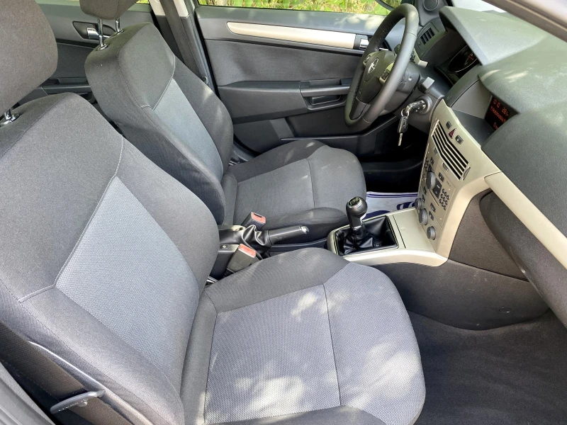 Opel Astra 1.3CDTI 90к.с 6ск , снимка 11 - Автомобили и джипове - 51041421