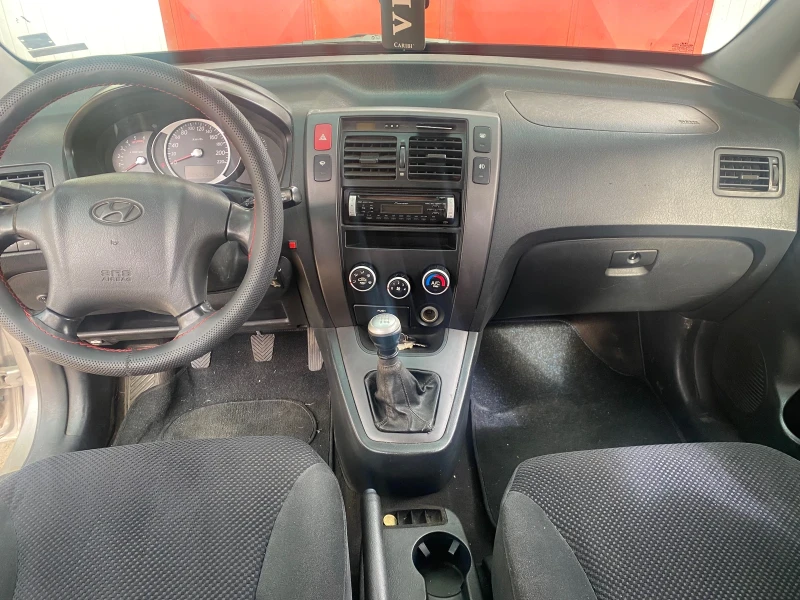 Hyundai Tucson 2.0 crdi, снимка 7 - Автомобили и джипове - 47563797