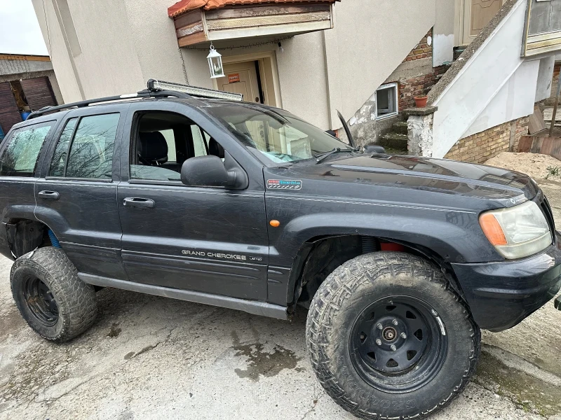 Jeep Grand cherokee 4.7 QUADRA DRIVE, снимка 14 - Автомобили и джипове - 48313354