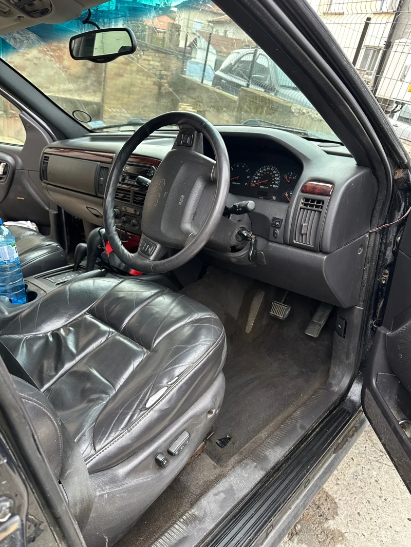 Jeep Grand cherokee 4.7 QUADRA DRIVE, снимка 13 - Автомобили и джипове - 48313354