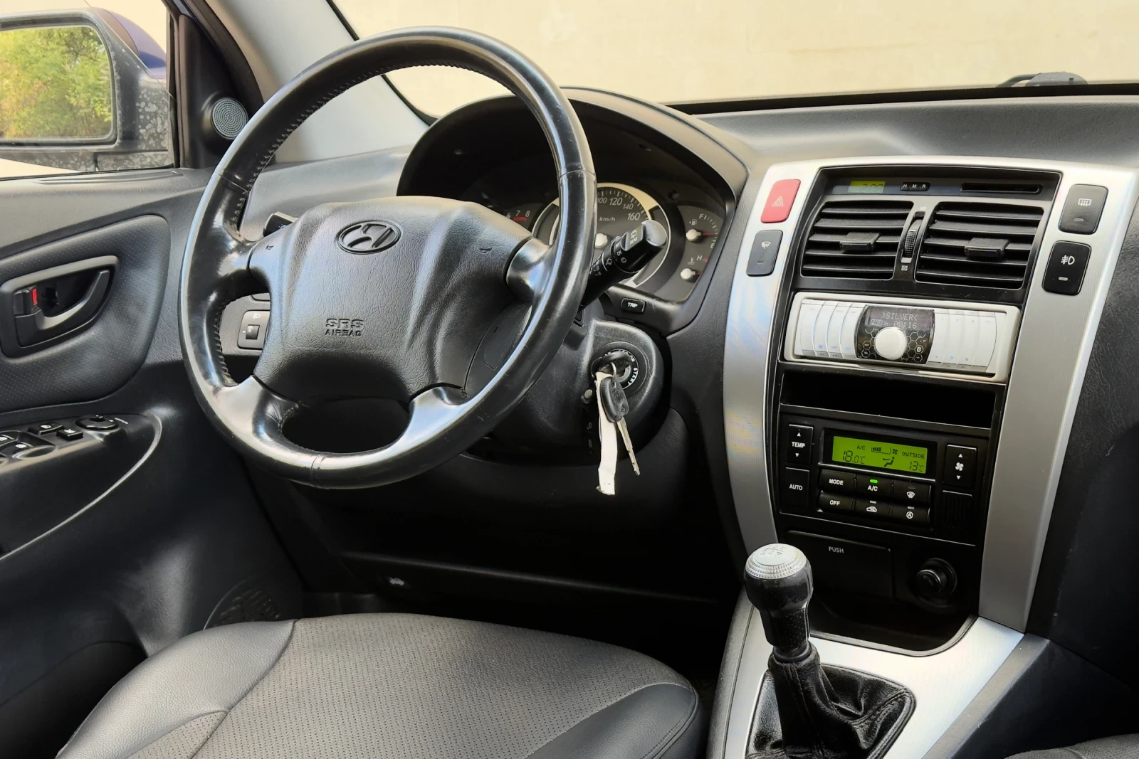Hyundai Tucson 2.0i//БЕНЗИН, снимка 12 - Автомобили и джипове - 56537284