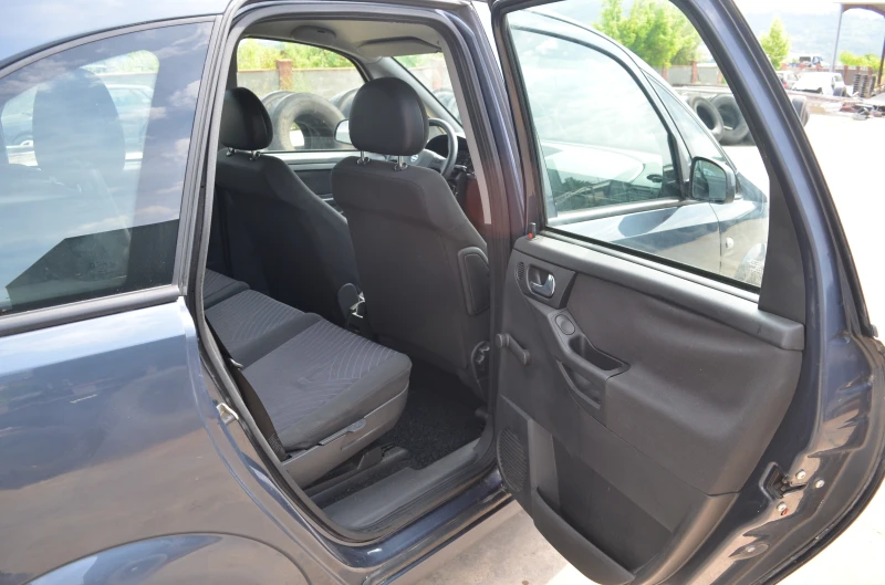 Opel Meriva 1.3 , снимка 15 - Автомобили и джипове - 50859176