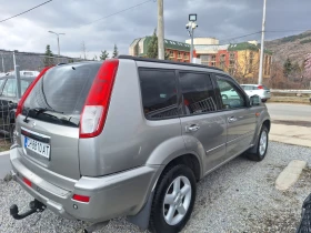     Nissan X-trail 2.0 GPL .  