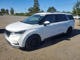 ������ Kia Carnival