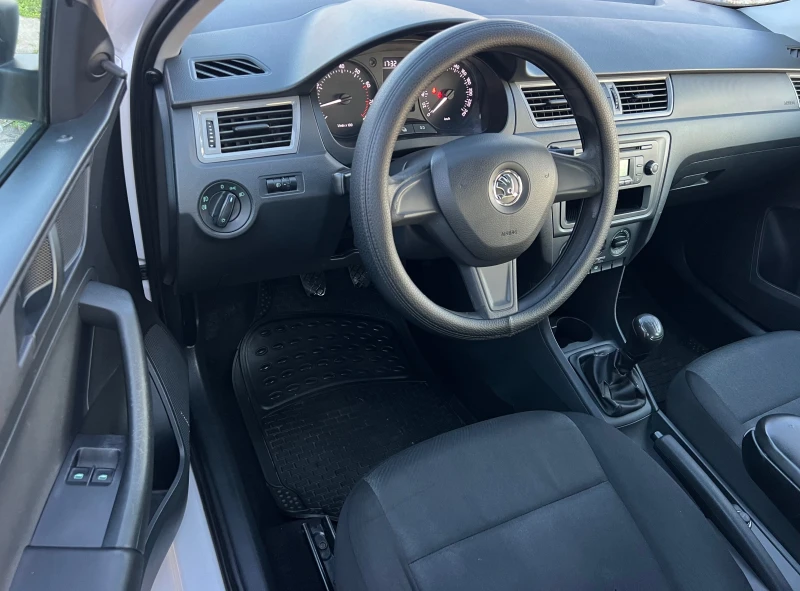 Skoda Rapid 1.2i KLIMATIK/SEDAN/UNIKAT, снимка 10 - Автомобили и джипове - 52855305