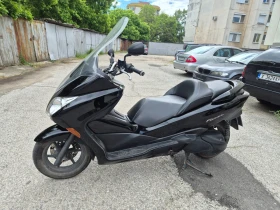 ������ Honda Forza