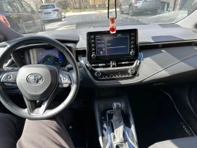 Toyota Corolla  2.0i HYBRID/ГАРАНЦИОННА/Перла, снимка 14